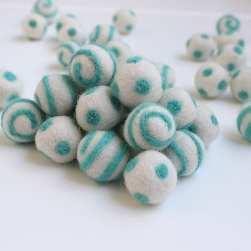 mint on white polka dot swirl felt balls